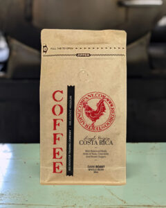 Bag of Costa Rica Single Origin dark roast specialty coffee with nut, chocolate, and brown sugar notes